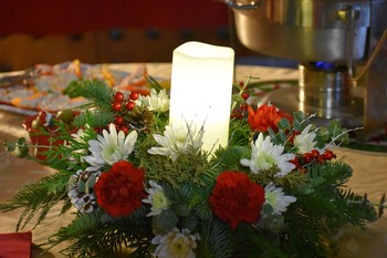 Festive Candle and Floral at Holiday Barrel Tasting