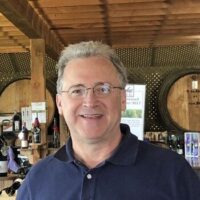 Photo of our team serving guests in our Tasting Room